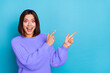 © deagreez - Portrait of attractive amazed cheerful girl demonstrating copy space ad new novelty isolated over bright blue color background