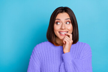 Canvas Print - Portrait of attractive curious cheerful girl looking aside choosing copy space guess isolated over bright blue color background