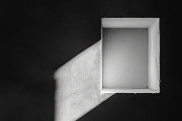 Aufkleber - Contemporary image of a sunlit concrete frame that accentuates its minimalist design, invoking a sense of artistic solitude and modern architectural focus.