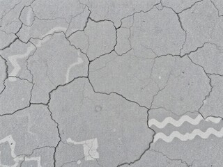 rough and weathered gray stony surface with intricate patterns, stones