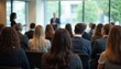 © Vintage Stock - Audience at a Professional Business Conference Listening to Speaker