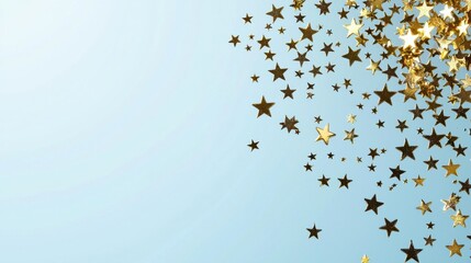 Poster - A sparkling scatter of golden stars against a soft blue background evokes a sense of wonder and celebration.