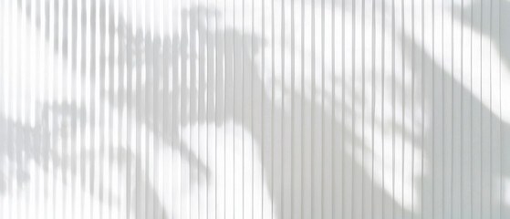 Poster - clean white background with vertical lines and soft shadows creates serene atmosphere. interplay of light and shadow adds depth and texture to image, enhancing its visual appeal