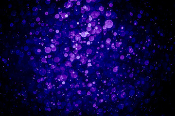 Wall Mural - Blurred photo with purple violet and blue dots visible glittering, shining brightly look and feel luxurious