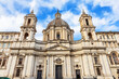 Front facade of the church of Sant'Agnese in Agone at Piazza Navona square in sunny day, Rome, Italy.