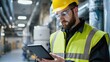 © Tam5 - Construction Worker Using Tablet in Industrial Environment