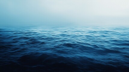 Poster - Deep blue ocean waves rolling under a foggy sky create a moody and atmospheric seascape, evoking a sense of mystery and tranquility