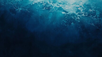Poster - Sunlight filters through the ocean surface, creating a mesmerizing deep blue water background with a gradient of light and shadow, perfect for evoking a sense of tranquility and depth