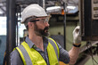 © Jack Tamrong - Portrait Caucasian male engineer working in manufacturing industrial factory