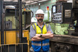 © Jack Tamrong - Portrait Caucasian male engineer standing arm crossed working in manufacturing industrial factory