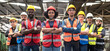 © Jack Tamrong - Photo group of males and females factory workers standing arm crossed in industrial factory