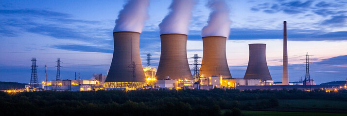 Poster - Power plant at dusk with cooling towers and smoke