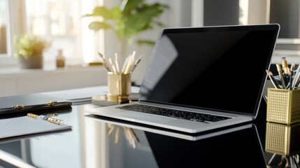 Poster - Modern Laptop Workspace With Gold Accents And Supplies