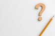 © A2Z AI  - Close-up of a pencil-drawn question mark symbol, showcasing a hand-sketched design with textured lines, representing curiosity, inquiry, or problem-solving