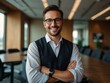 © claudunia - Handsome businessman with glasses, confident smile in a conference room.
