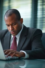 Poster - Businessman working on laptop in office setting