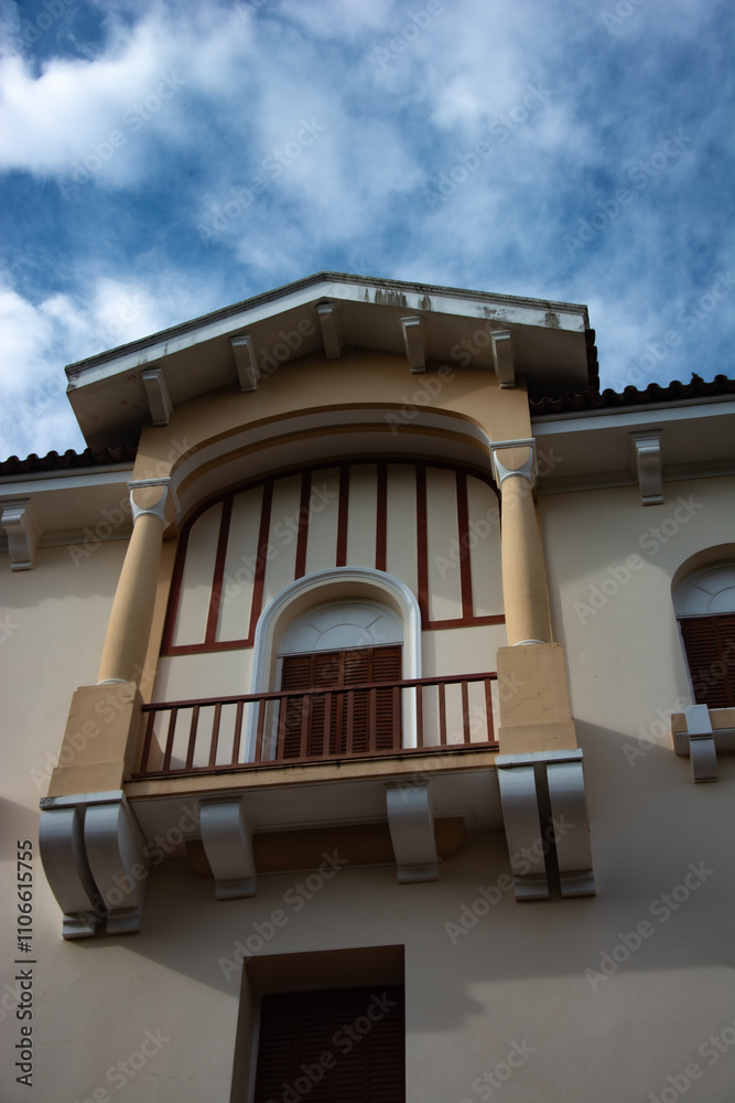 A vintage hotel balcony from the 1930s, showcasing classic architecture ...