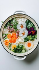 Wall Mural - 料理デザイン用の白い背景に食用花を添えた鮮やかな春野菜ラーメン