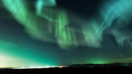 Wall Mural - aurora green and milky way galaxy mountain foothill city lights loop
