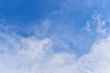 Wall Mural - beautiful blue sky and white fluffy group of clouds with sunrise in the morning, natural background