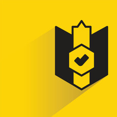 Poster - knight shield with drop shadow on yellow background