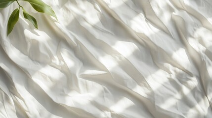 Poster - Soft, crumpled white paper sheet with interesting shadow play, isolated on a plain background to emphasize texture and minimalist beauty