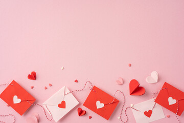 red and white envelopes with heart decorations on a pastel pink background evoke a romantic valentin