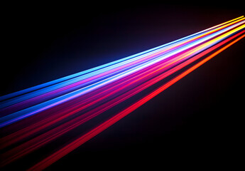 Wall Mural - A vibrant light beam with multiple colors of red, blue, and purple against a black background.