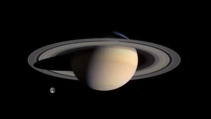 Wall Mural - animation depicting visual comparison of earth and saturn.
