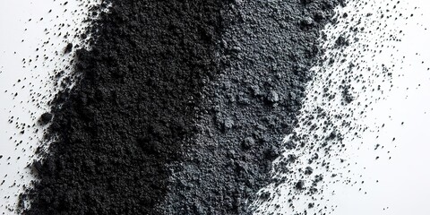Poster - Black powder spreads across a white surface creating a striking contrast and texture in a creative display of materials
