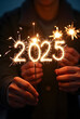 © Sabina Rasulova - Sparklers in the shape of the numbers 2025 in honor of the New Year. Sparkles of sparklers in the form of 2025. New Year 2025.