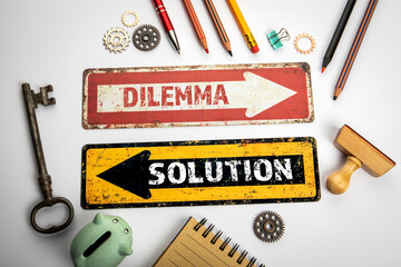 Wall Mural - dilemma and solution concept. red and yellow directional arrow with text on a white office desk