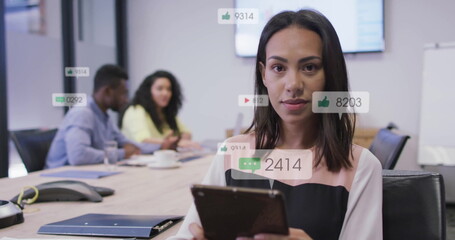 Poster - Image of icons and numbers over biracial businesswoman in office