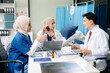 © Nuttapong punna - Medical, meeting and laptop for team in discussion, brainstorming and planning. Doctor, nurse on desk