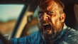 © COK House - Emotional middle-aged man in a car with a beard, shouting with anger, not driving but in passenger seat. Shirt color and eye expression unclear.