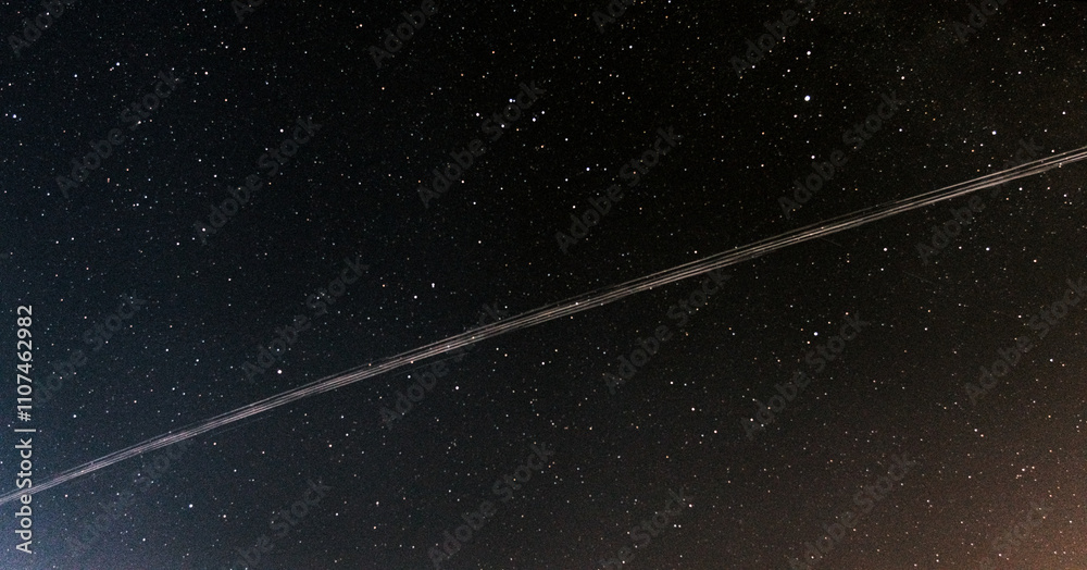 Stars In Line Starlink satellite constelation in the night sky Stock Photo | Adobe Stock