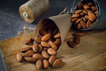 Poster - Almonds close-up on a light background