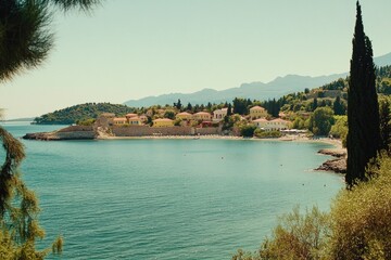 Wall Mural - A serene lake scene with a small island in the distance, great for travel or nature photography