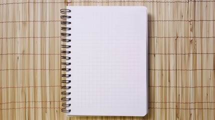 Aufkleber - A notebook placed on a traditional Japanese bamboo mat, perfect for writing or studying