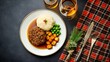 © Ingvar Shelly - scottish tradition art, burns night spread haggis, neeps, tatties, whisky, thistle, and robert burns works on tartan backdrop in a stylish flat-lay