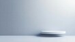 © Sumet - A minimalistic, modern display platform against a soft blue wall, perfect for showcasing products or artwork in a clean environment.
