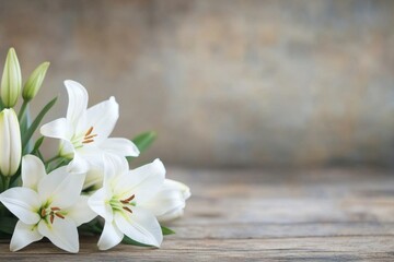 Canvas Print - Beautiful white lilies arranged on a rustic wooden table for decoration and ambiance