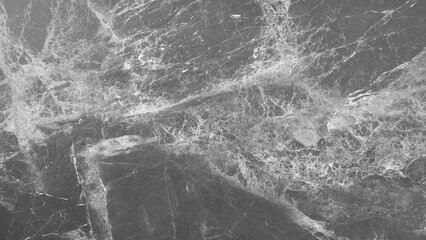 Leinwandbilder - A grey stone wall with a crack in it. The crack is long and narrow. The wall is made of marble