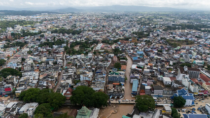 Wall Mural - Aerial view of the border between Thailand and Myanmar at Tachileik and Mae Sai districts after Sai river flooding.