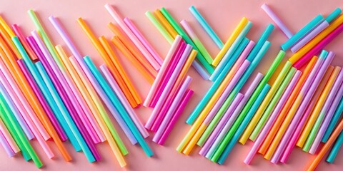 Poster - A vibrant array of rainbow-colored drinking straws scattered across a soft pink background, creating a playful and cheerful visual composition.