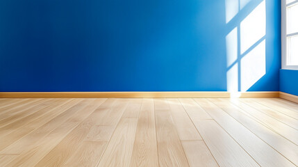 Poster - Empty room with light wood flooring and deep blue walls. Perfect for showcasing interior design, home staging, or minimalist decor 