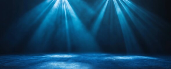 Poster - A dark stage illuminated by blue spotlights, creating a dramatic atmosphere perfect for performances or events.