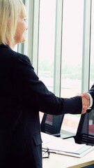 Poster - business people handshake with friend at office showing trust , friendship and success celebration .