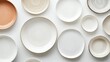 © SETSU ST - Elegant Display of Minimalist Ceramic Plates in Various Shapes and Sizes on a White Background for Modern Dining and Aesthetic Table Setting Ideas