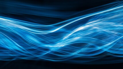 Poster - close-up abstract technology background featuring vibrant blue light trails on a dark background for